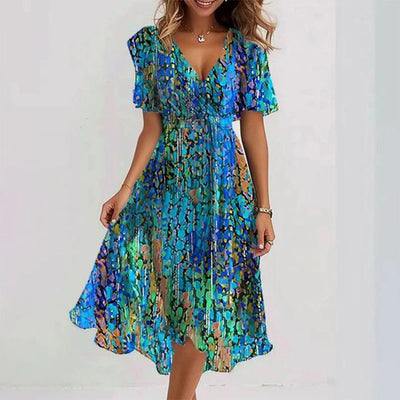 Blumiges Midikleid mit Flügelärmeln | Frisch und Feminin | Sommerlicher Stil