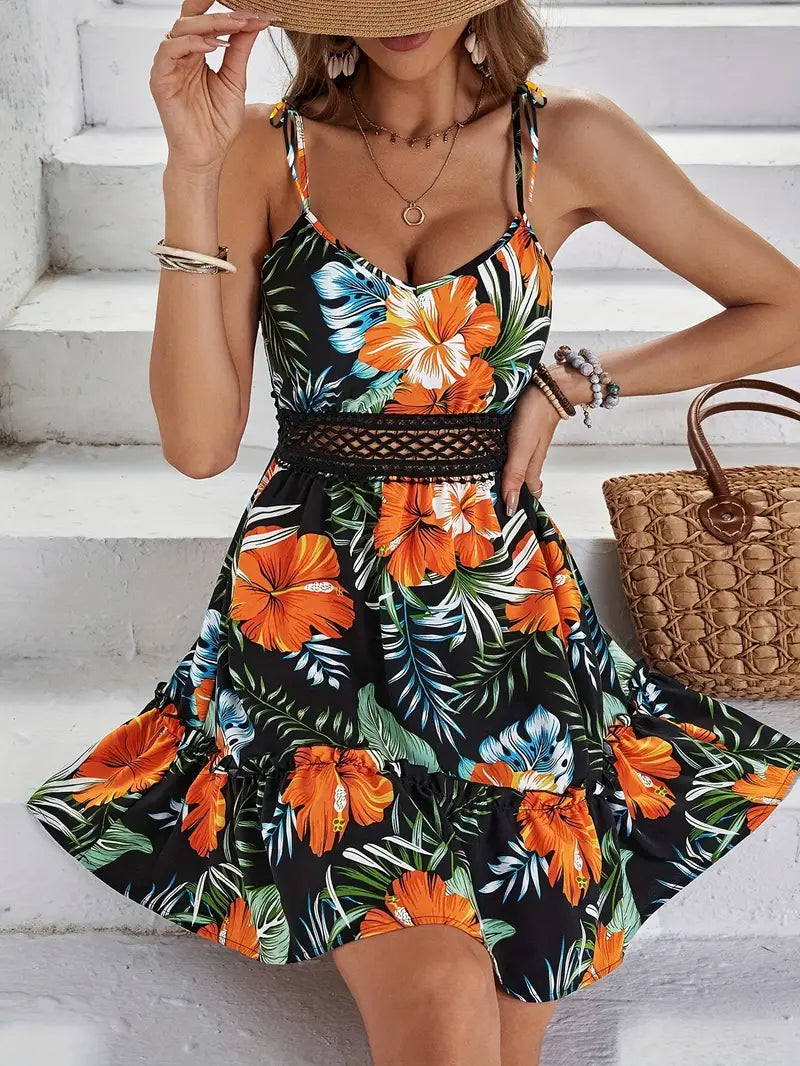 Ivella – Minikleid mit tropischem Blumendruck und Spitzentaille
