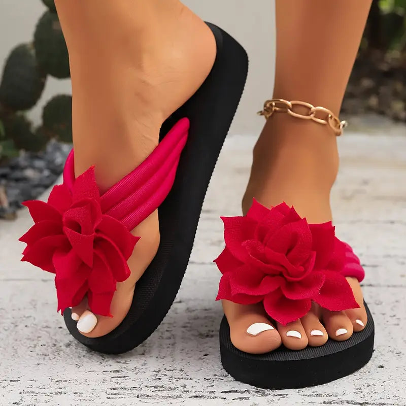 Lirienne – Plateau-Flip-Flops mit Blumen-Akzent