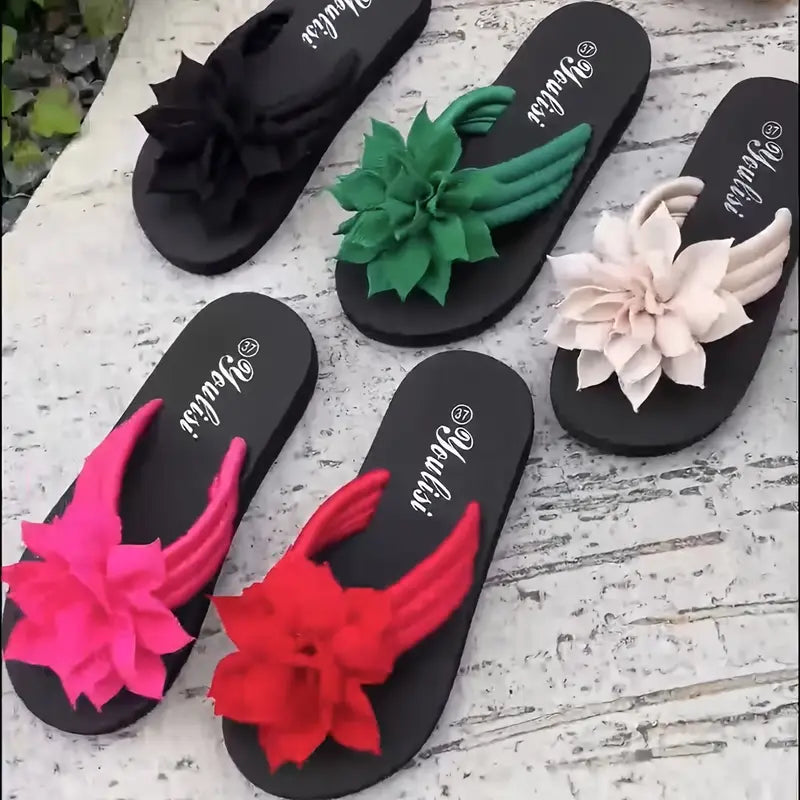 Lirienne – Plateau-Flip-Flops mit Blumen-Akzent