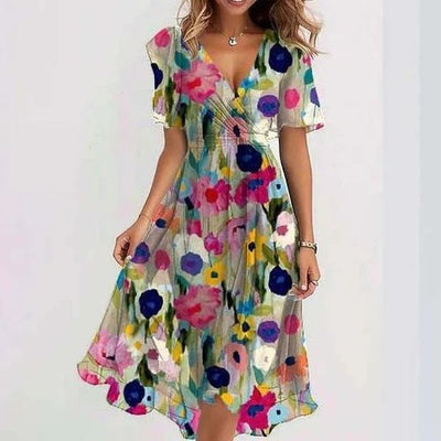 Blumiges Midikleid mit Flügelärmeln | Frisch und Feminin | Sommerlicher Stil
