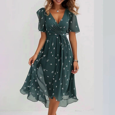 Blumiges Midikleid mit Flügelärmeln | Frisch und Feminin | Sommerlicher Stil