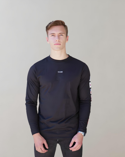Avelena | Schwarzes Langarm-Shirt mit Flaggen-Druck Auf Dem Linken Ärmel