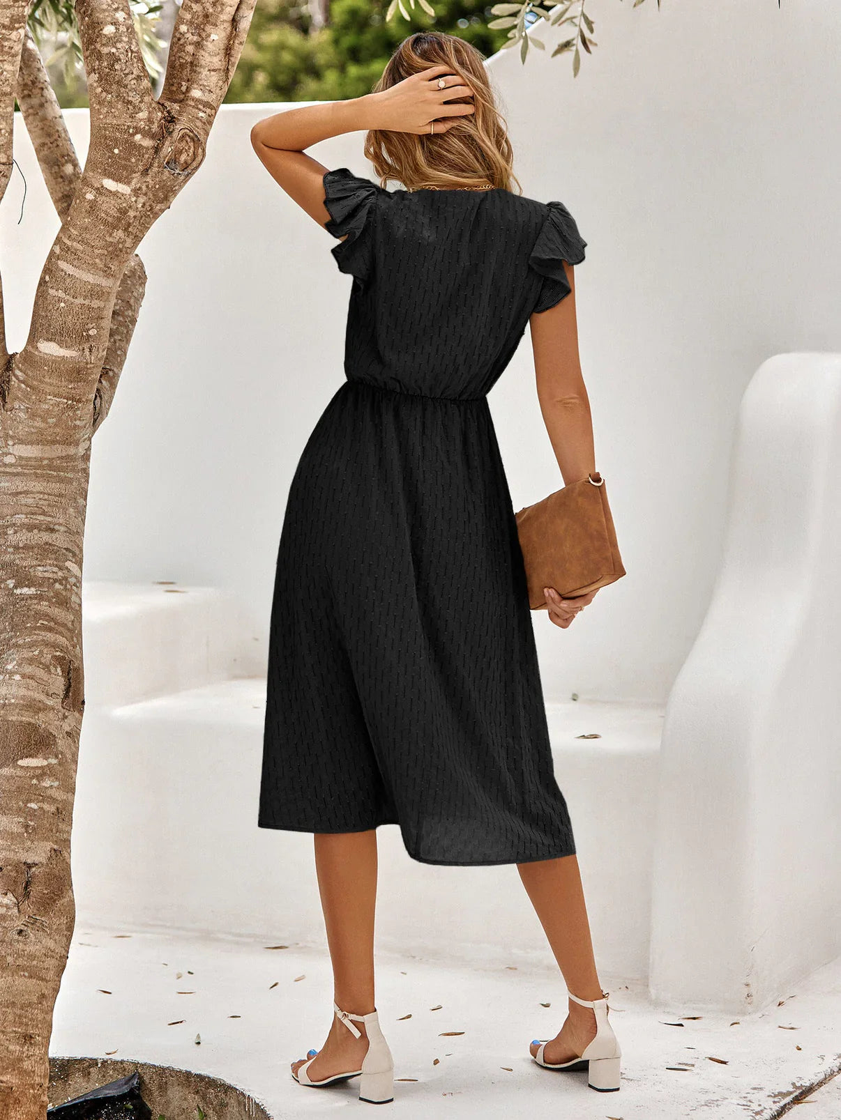 Ellie – Charmantes Kleid mit V-Ausschnitt und Flügelärmeln