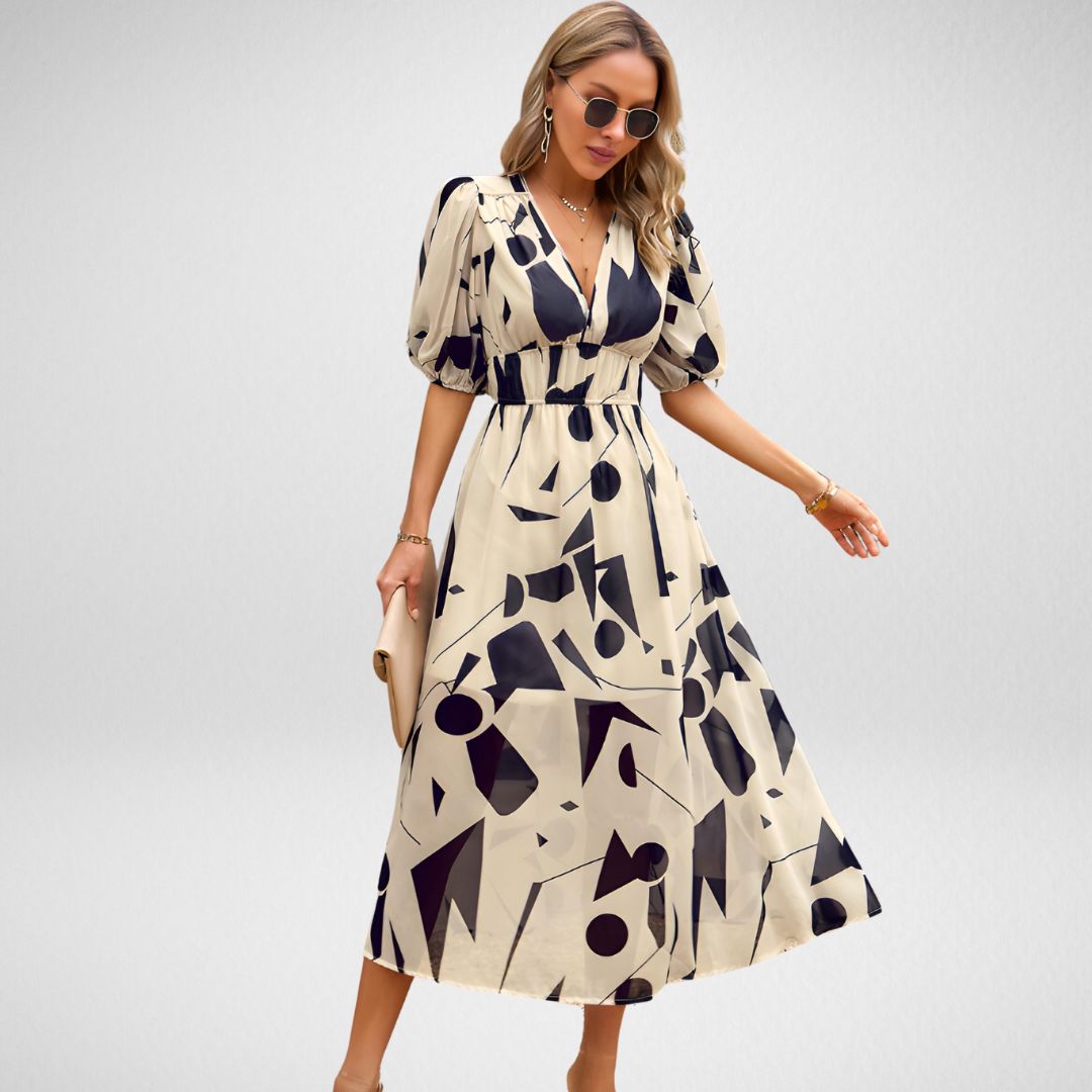 Maxikleid mit abstraktem Muster | Elegante Silhouette | Stilvolle Puffärmel