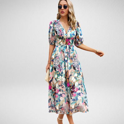 Maxikleid mit abstraktem Muster | Elegante Silhouette | Stilvolle Puffärmel
