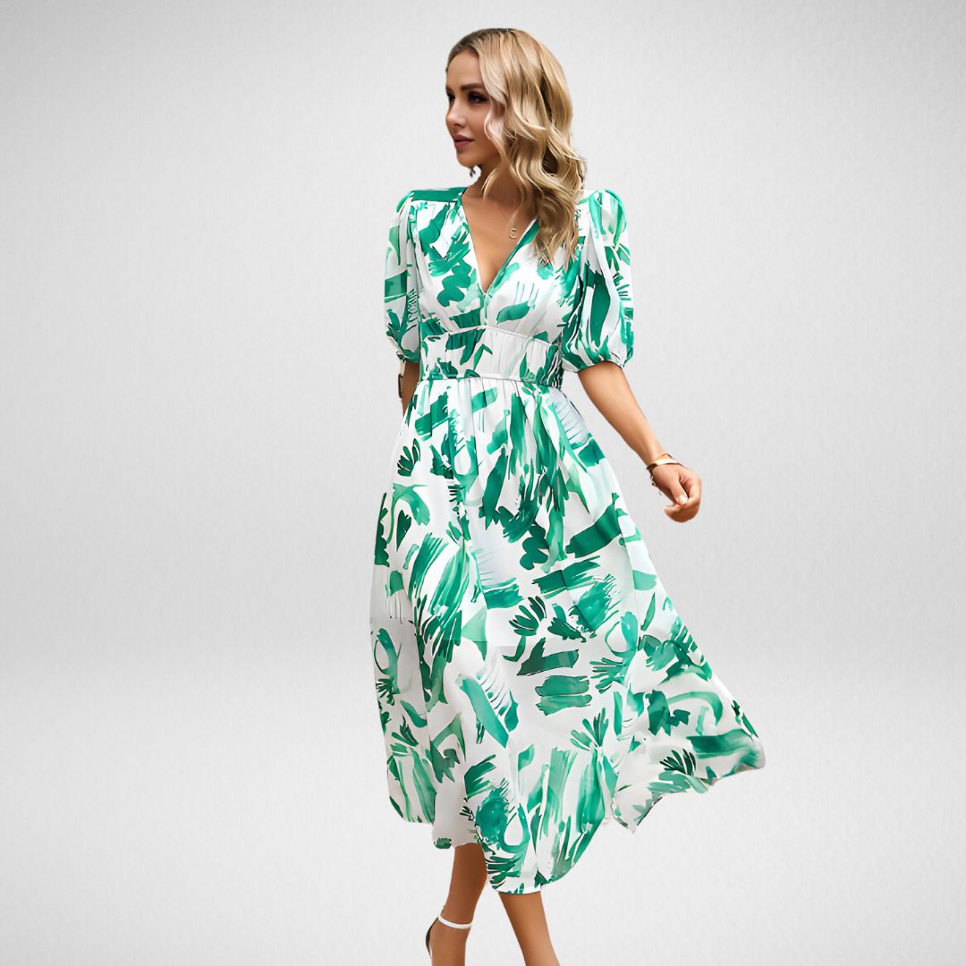 Maxikleid mit abstraktem Muster | Elegante Silhouette | Stilvolle Puffärmel