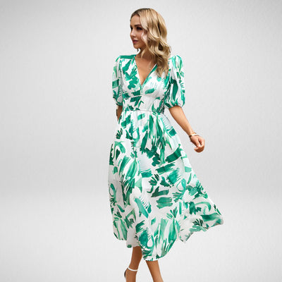 Maxikleid mit abstraktem Muster | Elegante Silhouette | Stilvolle Puffärmel