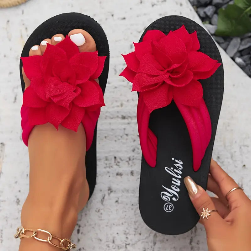 Lirienne – Plateau-Flip-Flops mit Blumen-Akzent