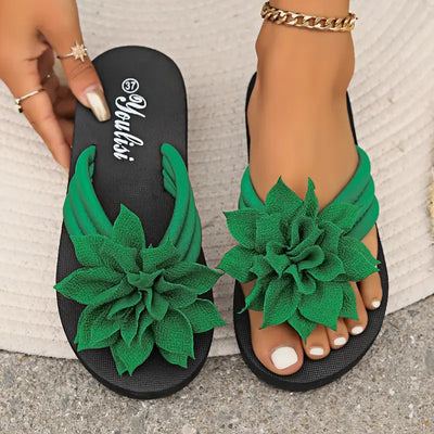 Lirienne – Plateau-Flip-Flops mit Blumen-Akzent